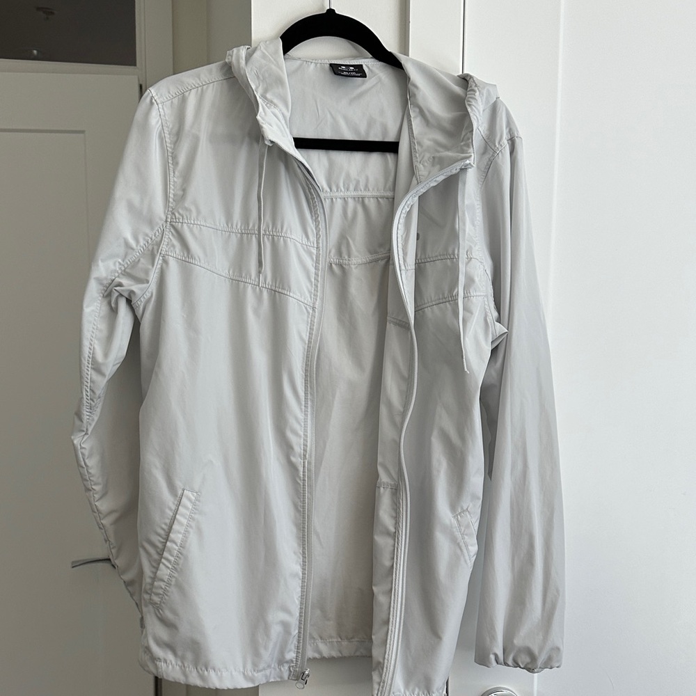 Oakley full zip hooded jacket. 
Regular Fit Light Gray.